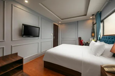 Chambre King Deluxe — ELEGANT PREMIER Hotel & Travel